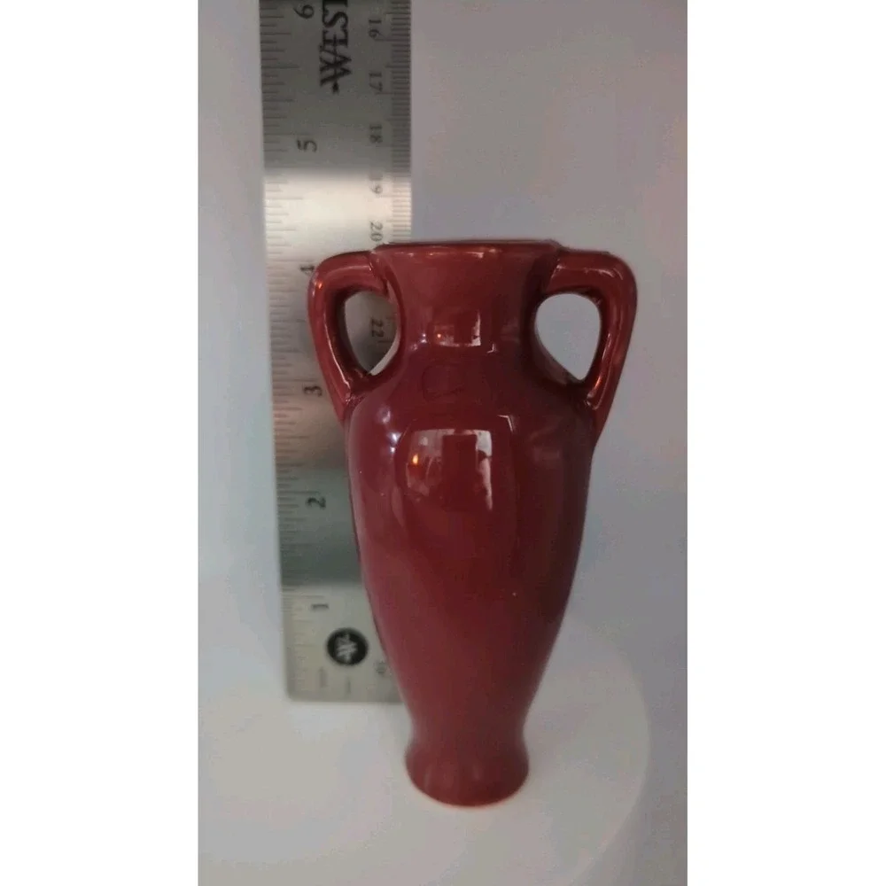 Unmarked burgundy pottery